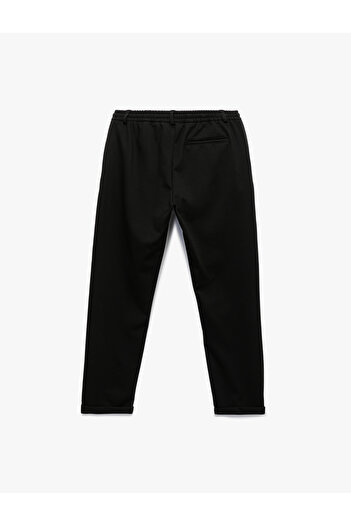 Koton Buttoned Pique Fabric Double Leg Slim Fit Trousers with Lace-Up Waist and Pocket Detail
