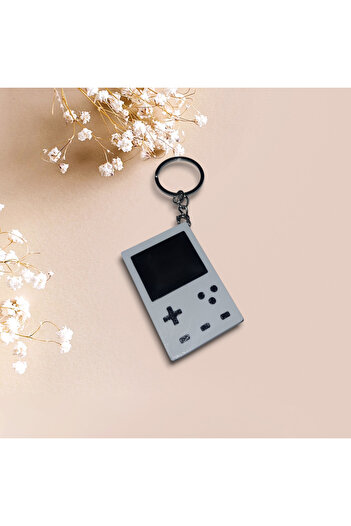 ŞIKIR ŞIKIR سلسلة مفاتيح صغيرة بيضاء بتصميم Retro Gameboy - ملحق مخصص لعشاق الحنين!