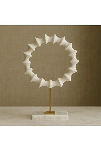 Vi Markets A decorative piece of art featuring a circular wavy design with a marble base.