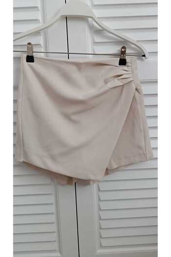 KAROL Asymmetrical Cut Beige Lycra Shorts Skirt with One Side Drape Detail