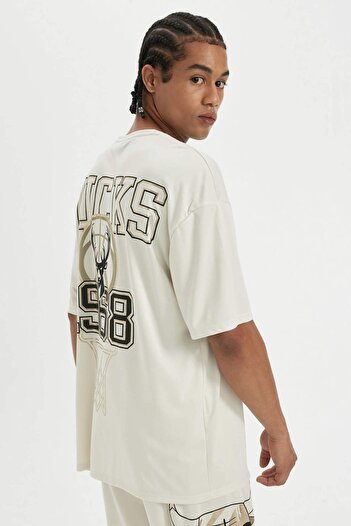 DeFacto DeFactoFit NBA Milwaukee Bucks Oversize Wide Fit Crew Neck Βαρύ ύφασμα πλάτης με εμπριμέ κοντό μανίκι