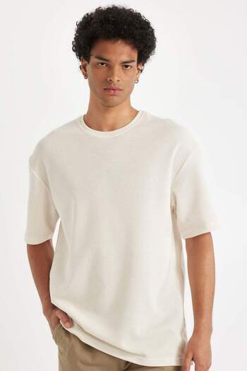 DeFacto Comfort Regular Fit Άνετη εφαρμογή Crew λαιμόκοψη κοντό μανίκι βαρύ ύφασμα Basic μονόχρωμο μπλουζάκι B4444AX24SP