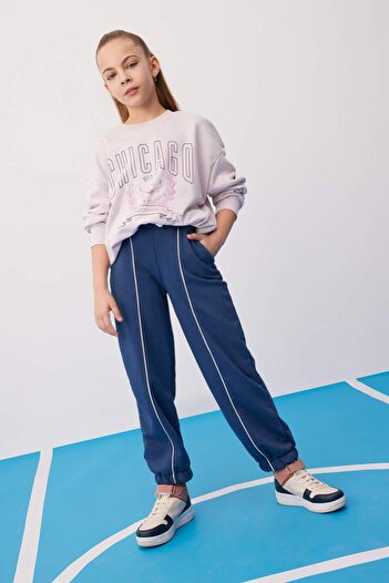 DeFacto Kız Çocuk Loose Fit Beli Bağcıklı Lastikli Paça Cepli Jogger Eşofman Altı C0309A824SP