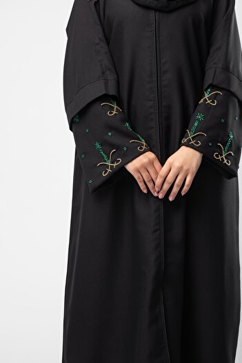 outline Separate sleeve embroidered with the two swords and palm tree logo