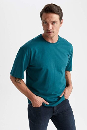DeFacto Oversize Wide Fit Crew Neck Basic μονόχρωμο κοντομάνικο μπλουζάκι από 100% βαμβάκι T7037AZ23SP
