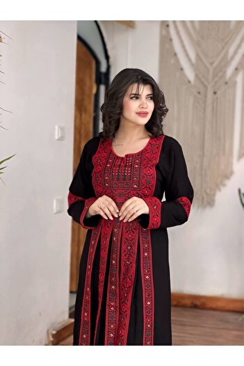 Lyaly aljlabyh A luxurious black dress with heavy gold embroidery and charming traditional patterns, for a unique royal look.