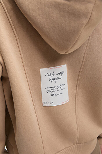 GRIMELANGE VYSELLE Kadın Önü Kesikli Metal Fermuarlı Kapüşonlu Etiket Detaylı Oversize Vizon Sweatshirt