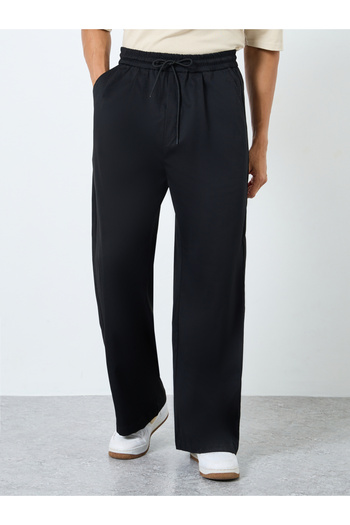 Styli Solid Oversized Pleated Trousers with Drawstring