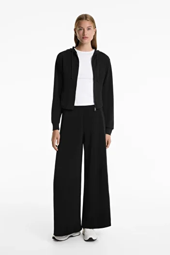 Oysho Wide leg side-pleated trousers with soft-touch modal.