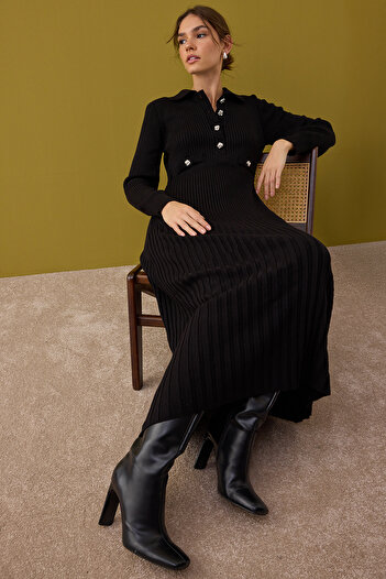 Trendyol Modest Μαύρο μεταλλικό φόρεμα με λεπτομέρεια από πλεκτό ριμπάνα TCTAW26EB00012