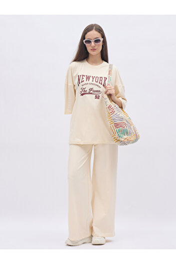 Styli Cream NY Print Oversized T-Shirt and Wide Leg Joggers Co-Ords