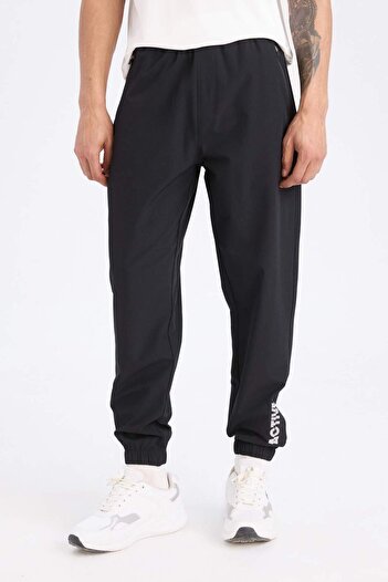 DeFacto Fit Dokuma Sporcu Jogger Eşofman Altı Slim Fit Dar Kesim Çift Cepli C1212ax24sp