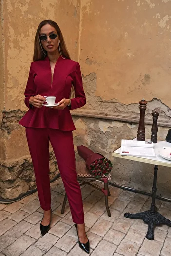 Made of Emotion Peplum jumpsuit with long sleeves