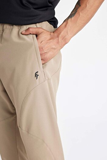 DeFacto DeFactoFit Sporcu Jogger Eşofman Altı Slim Fit Dar Kesim Dokuma Üç Cepli Fermuarlı Paça B2780AX24SM