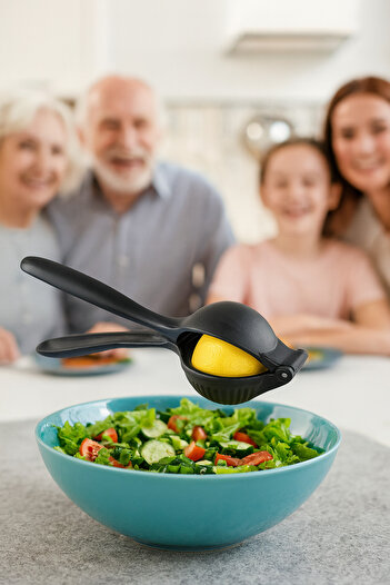 Cornella Cast Black Metal Hand Citrus - orange - Lemon Juicer
