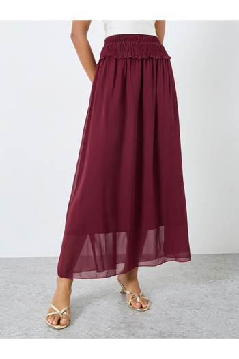 Styli Solid Smocked Waist A-Line Maxi Skirt