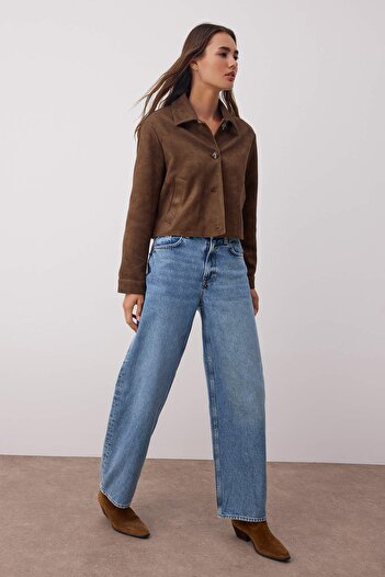 Trendyol Collection Niebieskie jeansy z wysokim stanem i luźnym krojem TWOAW26JE00188