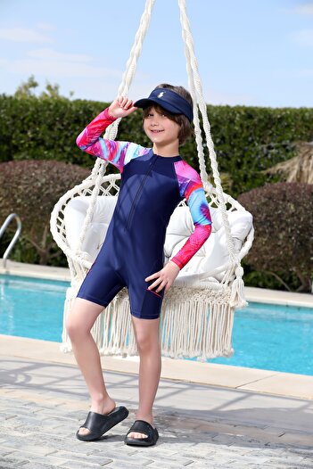 La Mer Boys' swimsuit with a sporty design that covers the body and provides protection and flexibility during movement.