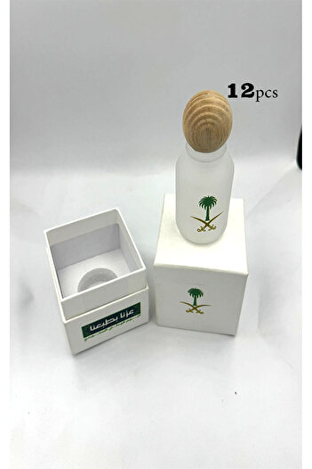 Mini Wooden perfume distributions with the National Day logo printed on them