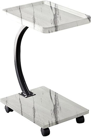 co arma Small C-shaped two-tiered side table next to the sofa and bed