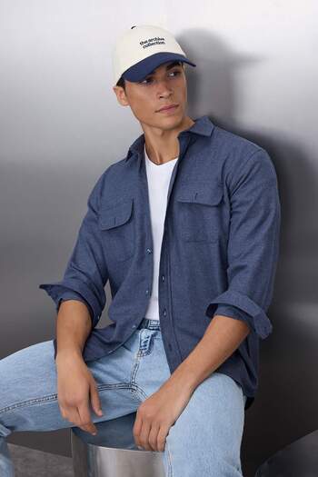Trendyol Collection Texturovaná zimní bunda Indigo Regular Fit s dvojitou kapsou Tmnaw22Go0350