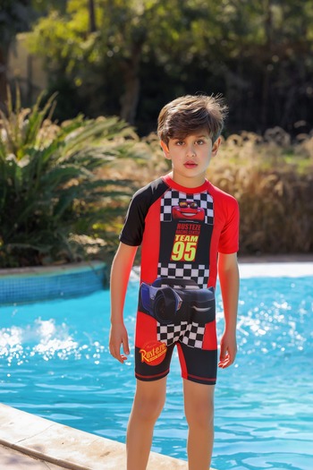 La Mer Boys' one-piece swimsuit with distinctive cartoon graphics and bright summer colors