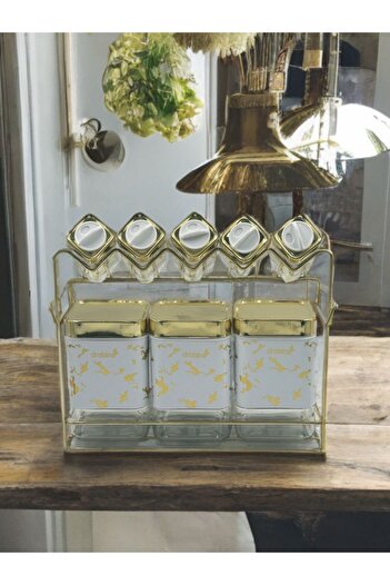 drobina White glass and marble salt shaker and spice jar set with gold-colored lids and decoration, 8 pieces, with a metal stand