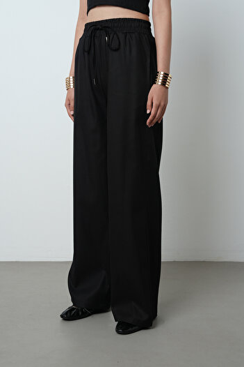 Orfeo Negro Women's Wide Leg Elastic Waist Solid Color Trousers