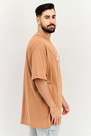 New Balance Men Sportswear Fit Short Sleeve Graphic Print Outdoor T-Shirt, Brown