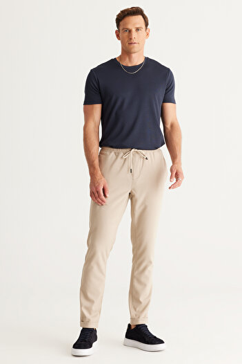 AC&Co / Altınyıldız Classics Erkek Bej Slim Fit Rahat Kesim Beli Bağlamalı Yan Cepli Jogger Pantolon