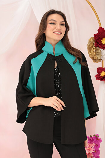 Vanessa Line RO Black wool poncho with turquoise fabric inserts