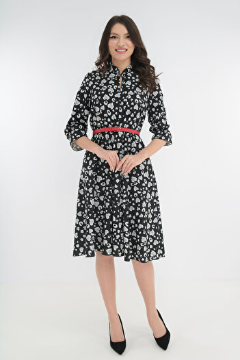 Vanessa Line RO Black dress with animal print and a red belt at the waist