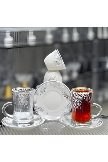Generic 36-piece engraved cup and saucer set
