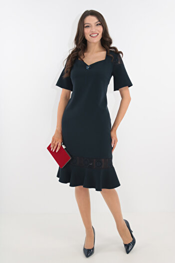 Vanessa Line RO Elegant navy blue dress with lace and ruffles at the hem