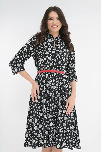 Vanessa Line RO Black dress with animal print and a red belt at the waist