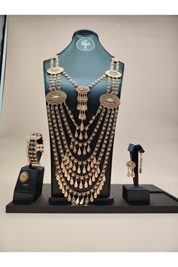 GENERIC4 Large 21 karat gold alternative royal set, consisting of 4 pieces