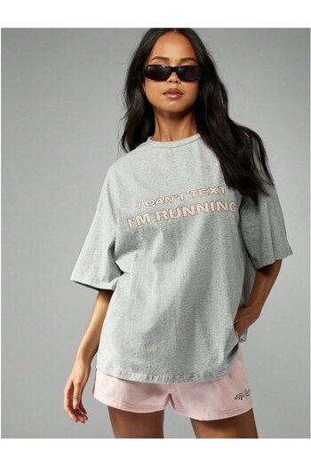 Kaptins Women's T-Shirt with the Message, "I'M Running, I Can'T Write" Printed on It.