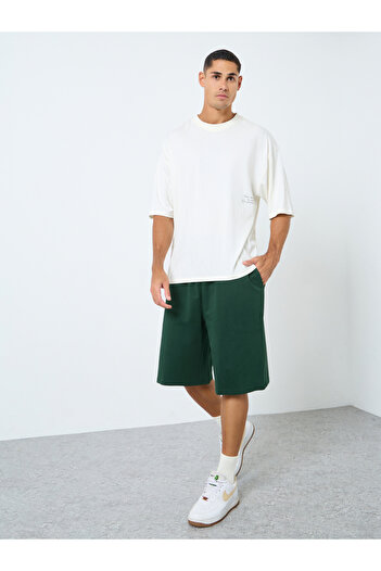 Styli Solid Oversized Shorts with Drawstring