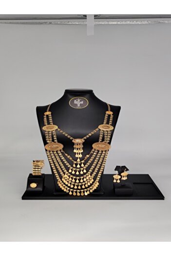GENERIC4 Large 21 karat gold alternative royal set consisting of 4 pieces