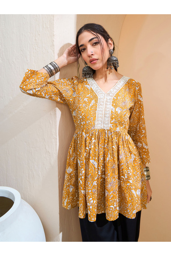 Sassafras By Styli Mustard Floral Cambric V Neck Peplum Kurti