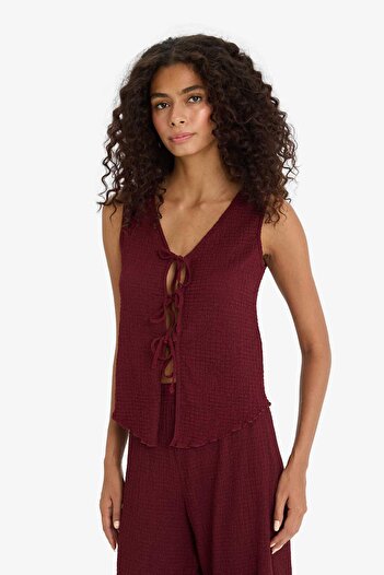 DeFacto Slim Fit Dar Kesim V Yaka Önden Bağlamalı Bürümcük Kolsuz Bluz F7992AX25AU