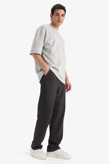 DeFacto Bol Rahat Kesim Wide Leg Üç Cepli Geniş Paça Yazlık Pantolon F3147AX25SP