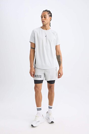 DeFacto DeFactoFit Slim Fit Dar Kesim Fermuarlı Telefon Cepli Sporcu Taytlı Şort Z2147AZ25SP