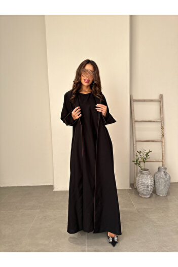 outline Daily black abaya with an inner dress attached with brown strings