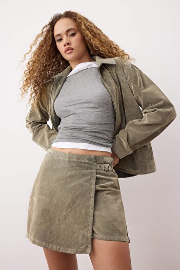 Trendyol Collection Beige Suede Look Flock Printed Mini Denim Shorts Skirt Twoaw26Sr00040