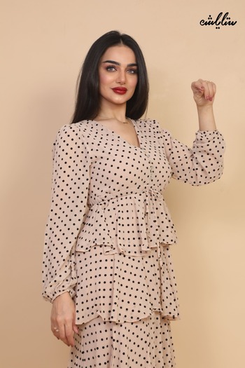 Stylish Ultra-chic midi dress with a modern layered cut and polka dot style.