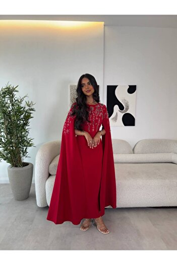 VİVİ Elegant red dress decorated with pearls and stones and a flowing cape