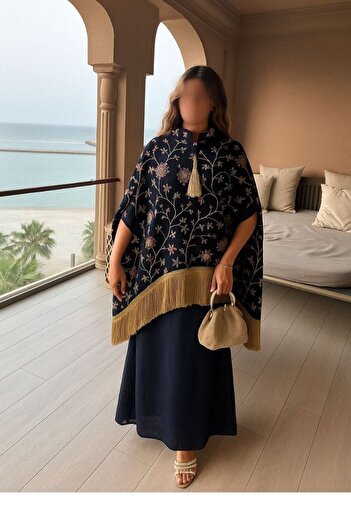 VİVİ Luxurious embroidered jalabiya with an elegant cape decorated with golden fringes
