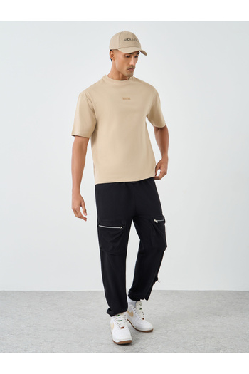 Styli Oversized Stretch Athleisure T-Shirt with Slogan Print