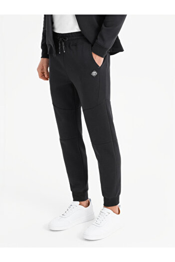 OMBRE Men's sweatpants with ribbed cuffs and decorative zipper - black V3 OM-PASK-0226 XL